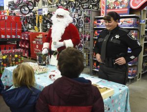 Preston County deputies participate in annual "Shop With a Cop" event for underprivileged children